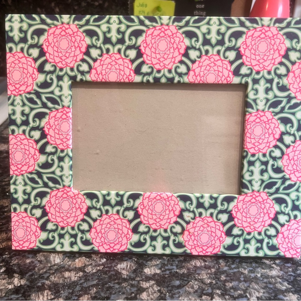 Lilly Pulitzer “Private Property Pink & Green Floral w Navy background frame.